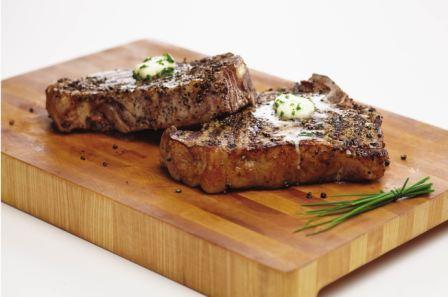 Pepper Rubbed Porterhouse Steak with Chive Butter