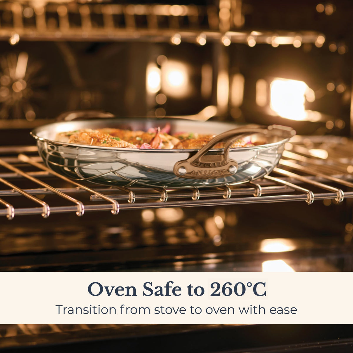 Anolon EverLast stainless steel skillet with roast chicken on an oven rack, oven safe to 260°C