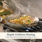 Lemon-dill fish fillets searing in an Anolon EverLast stainless steel skillet on a gas stove, showing rapid, uniform 3-ply clad heating